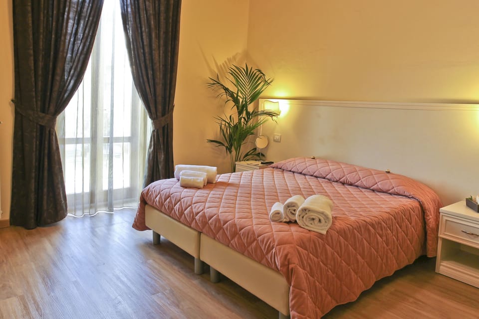 Select Comfort beds, minibar, in-room safe, desk