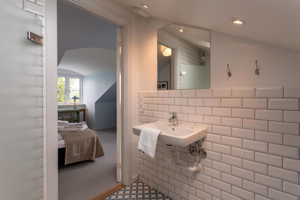 Double Room, Private Bathroom, Sea View | Bathroom | Eco-friendly toiletries, hair dryer, slippers, towels