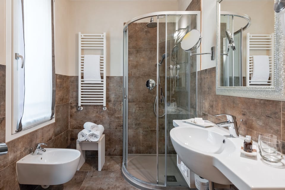 Shower, rainfall showerhead, eco-friendly toiletries, hair dryer