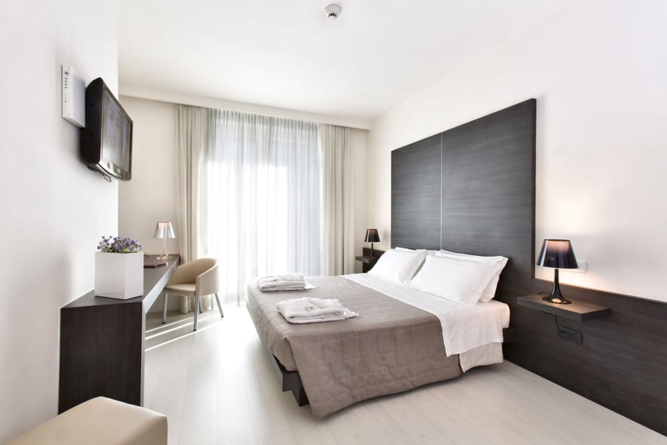 Premium bedding, memory foam beds, minibar, in-room safe