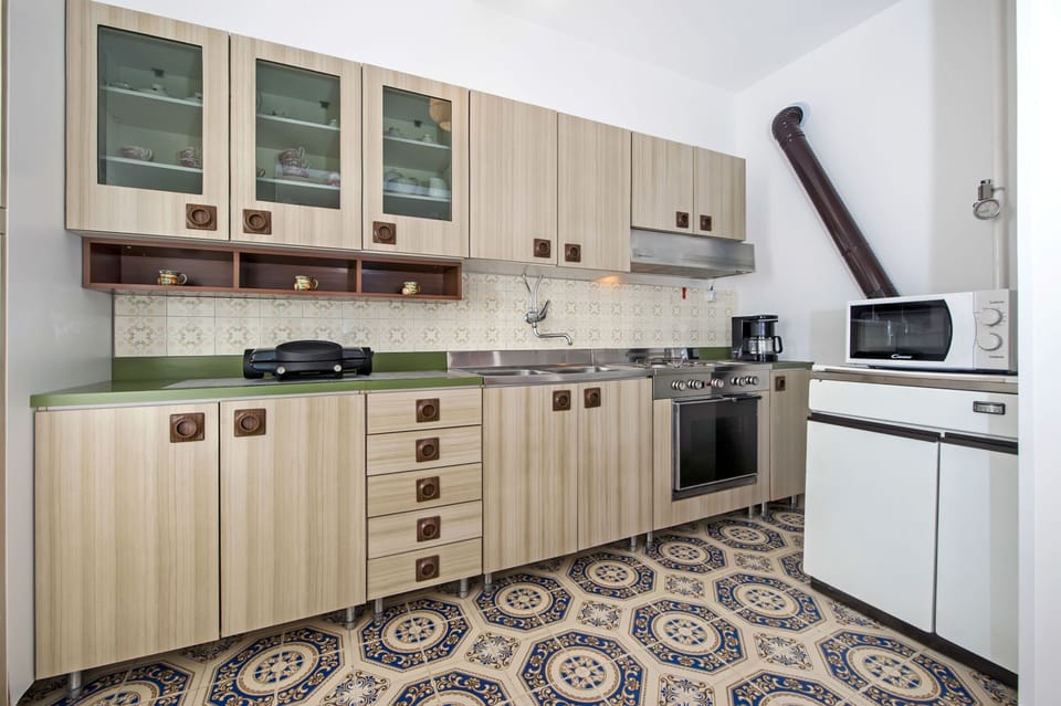 Apartment | Private kitchen | Fridge, microwave, stovetop, coffee/tea maker