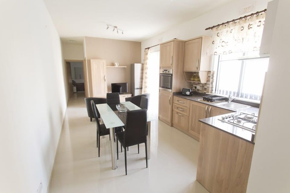 Comfort Apartment, 2 Bedrooms, Beach View | Private kitchen | Full-size fridge, microwave, oven, stovetop