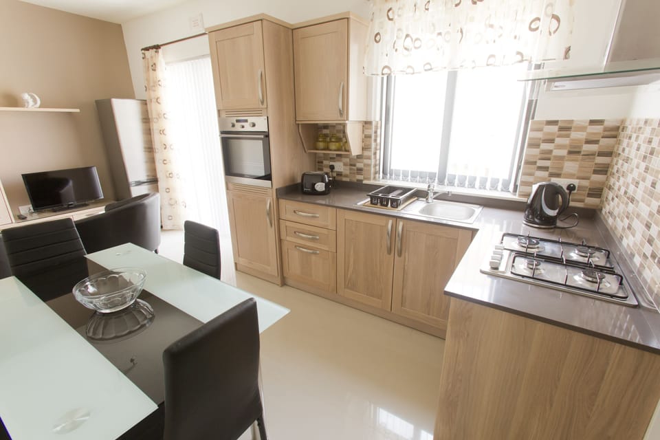 Comfort Apartment, 2 Bedrooms, Beach View | Private kitchen | Full-size fridge, microwave, oven, stovetop