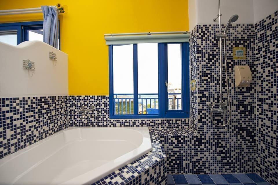 Romantic Double Room, Ocean View | Bathroom | Free toiletries, hair dryer, slippers, towels