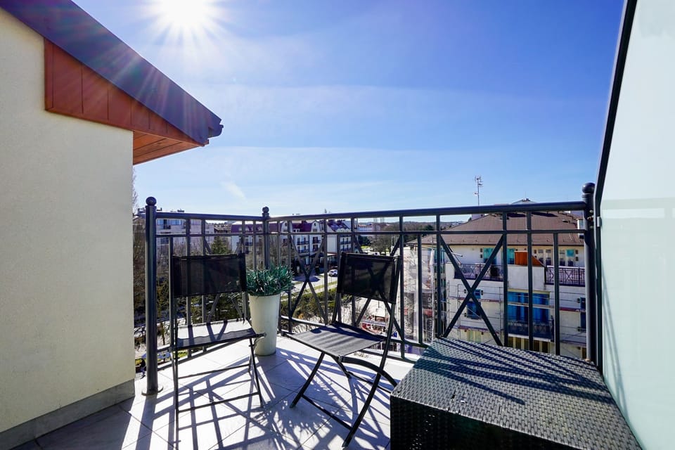 Deluxe Apartment, Multiple Beds, Partial Sea View | Balcony