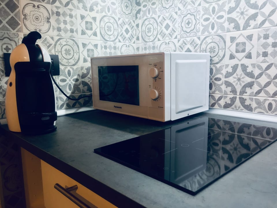Full-size fridge, microwave, stovetop, espresso maker