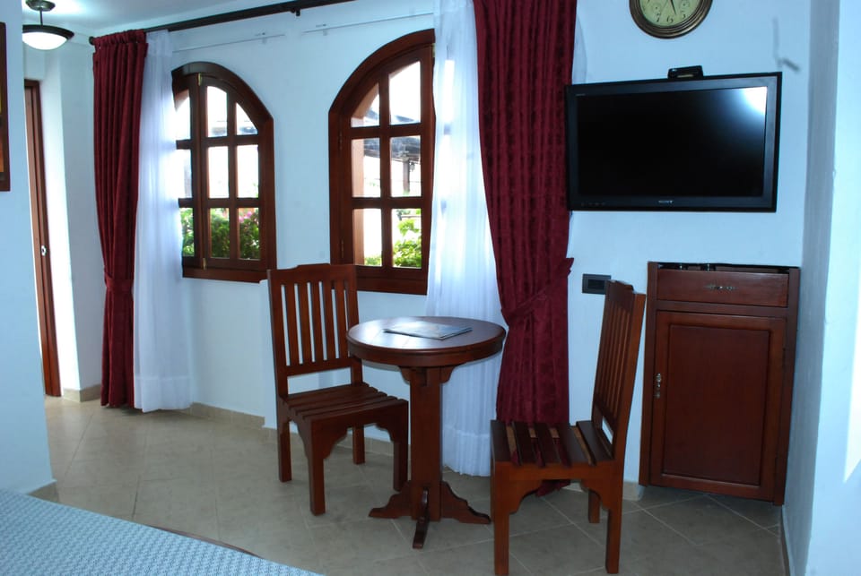 Deluxe Triple Room, Multiple Beds, City View, Tower | Minibar, in-room safe, blackout drapes, soundproofing