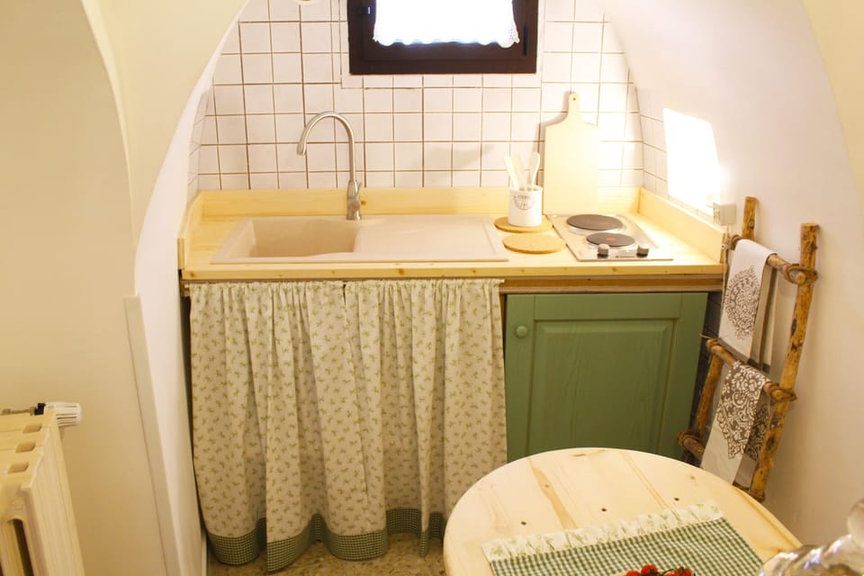 Deluxe Suite (Trullo) | Private kitchenette | Shared fridge, coffee/tea maker, electric kettle
