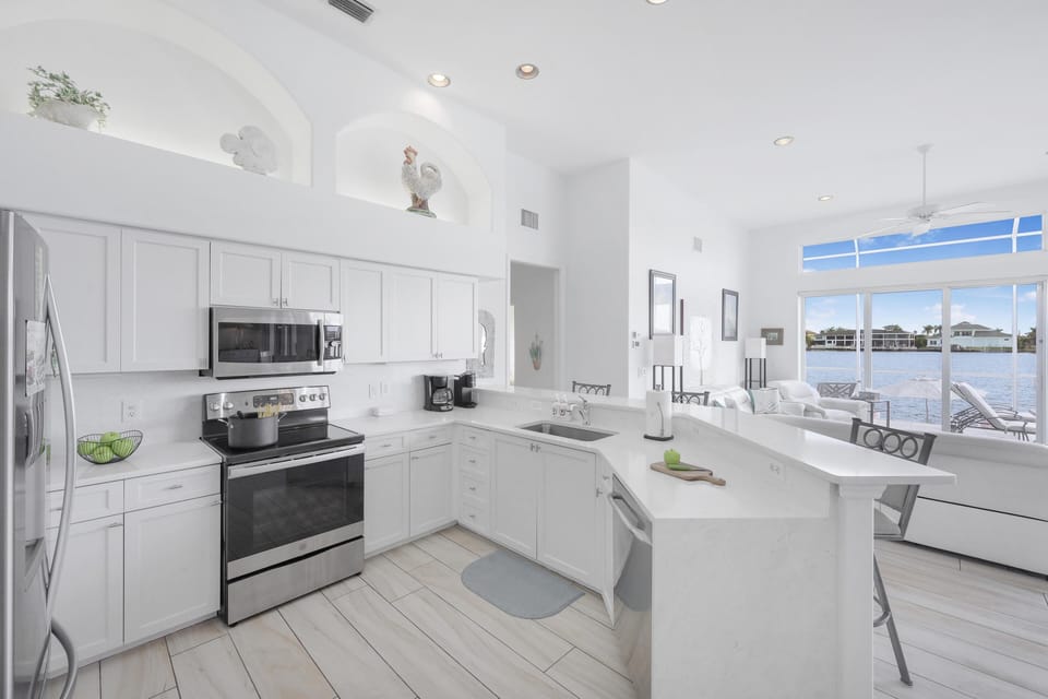 House, Multiple Beds (Waterfront home with views, pool and ) | Private kitchen | Oven, toaster