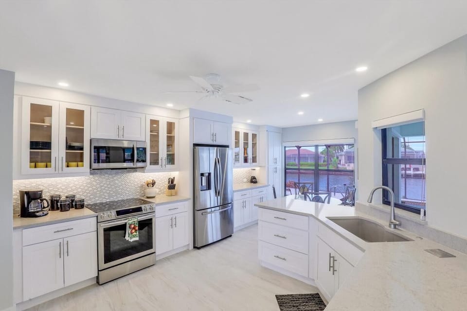 House, Multiple Beds (Pet-friendly waterfront home on key l) | Private kitchen | Fridge, microwave, oven, stovetop