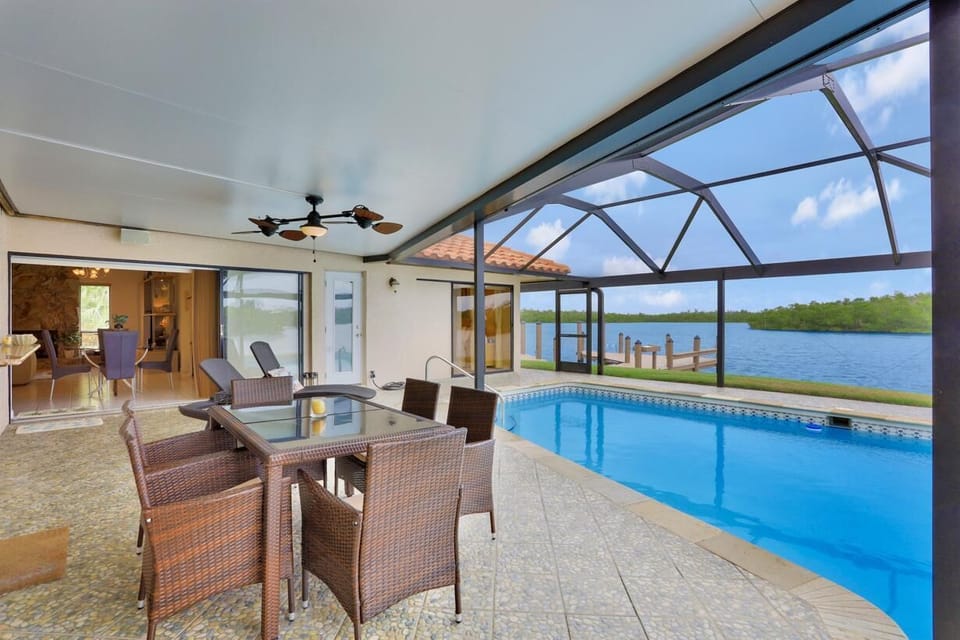 House, Multiple Beds (Waterfront home on key lot with pool/) | Pool | A heated pool