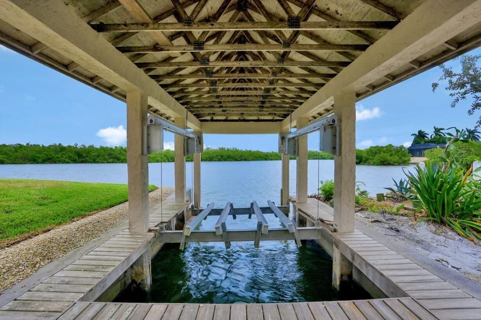 House, Multiple Beds (Waterfront home on key lot with pool/) | View from property