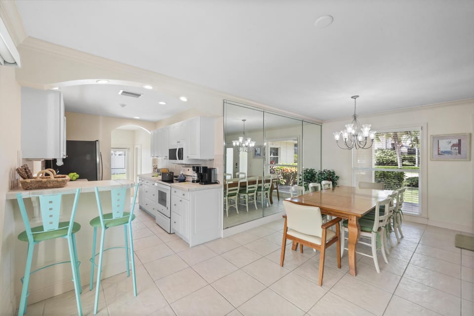 House, Multiple Beds (Pet-friendly waterside home with pool) | Private kitchen | Fridge, microwave, oven, stovetop