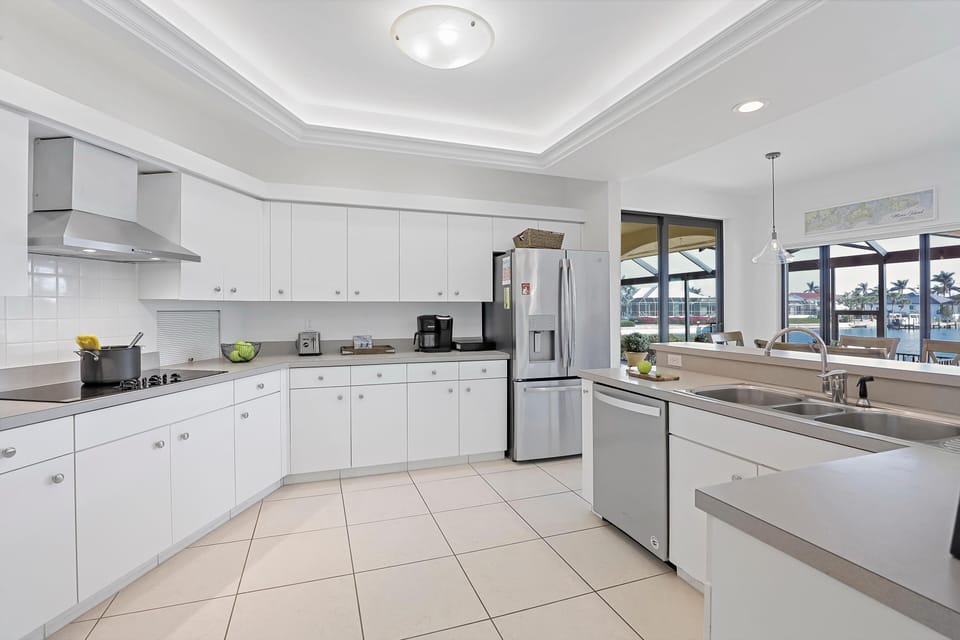 House, Multiple Beds (Serene waterfront home with pool, spa) | Private kitchen | Oven, toaster