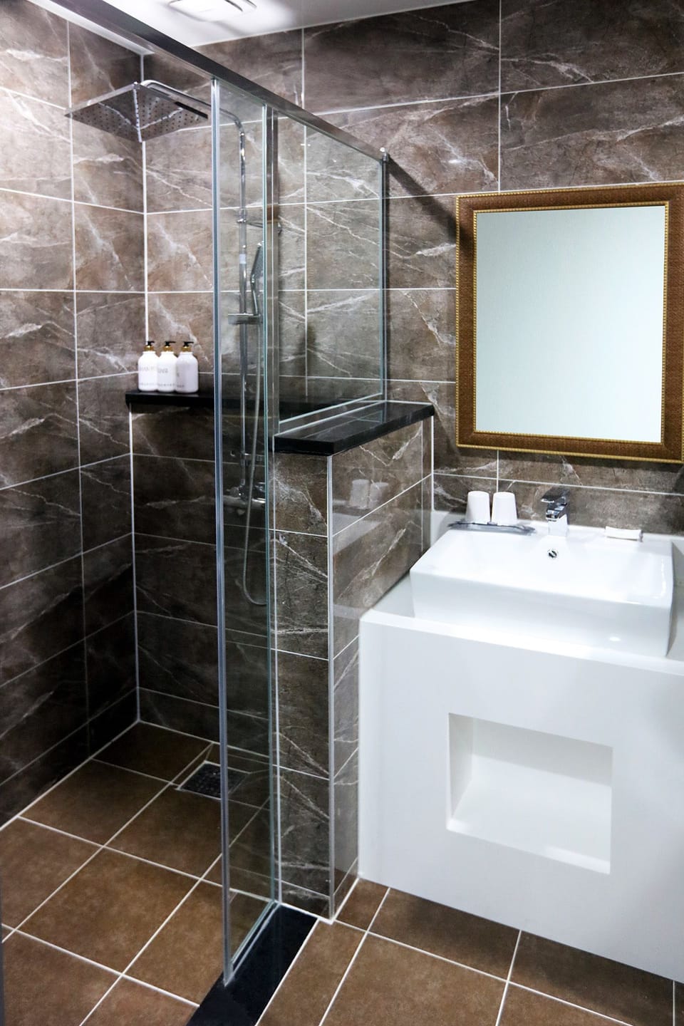 Shower, free toiletries, hair dryer, slippers