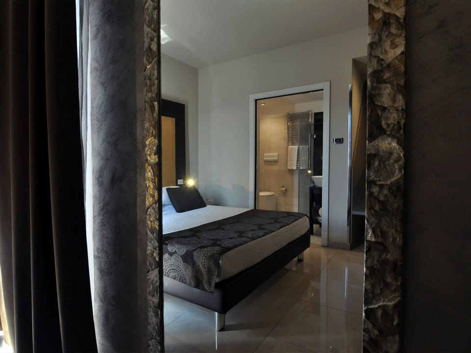 Frette Italian sheets, premium bedding, down comforters