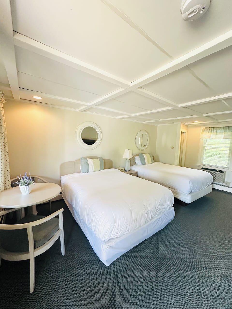 Standard Room, 1 Queen and 1 Full Bed | Iron/ironing board, bed sheets