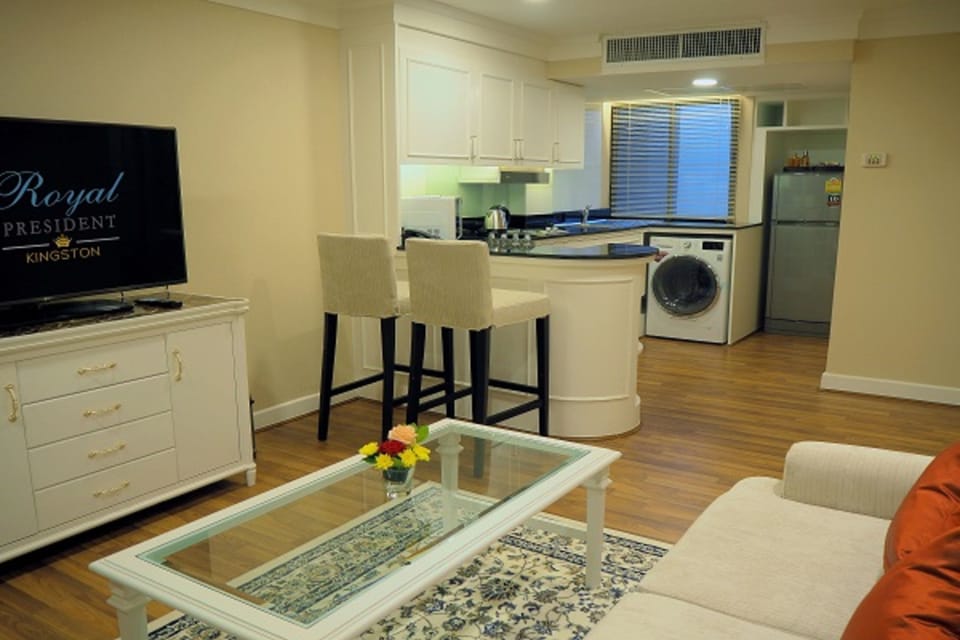 Junior Family Suite (2 Bedroom) | Living area | 32-inch LCD TV with satellite channels, TV