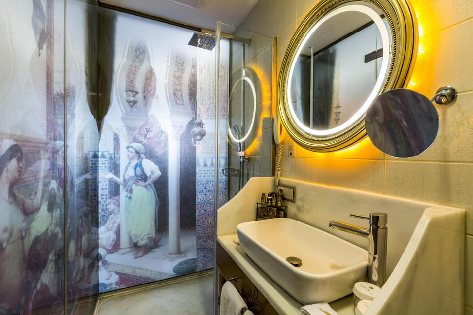 Shower, free toiletries, hair dryer, slippers