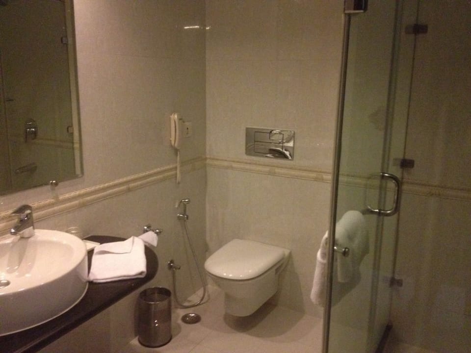 Separate tub and shower, free toiletries, hair dryer, slippers