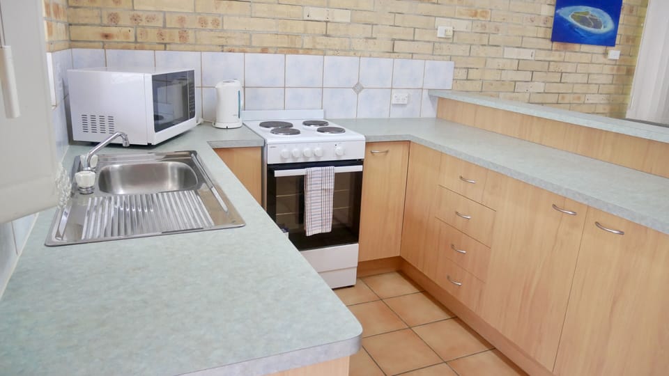 Family Apartment | Private kitchen | Coffee/tea maker, fridge, microwave, cookware/dishes/utensils