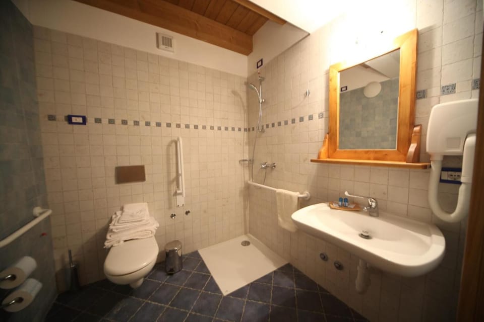 Shower, rainfall showerhead, towels