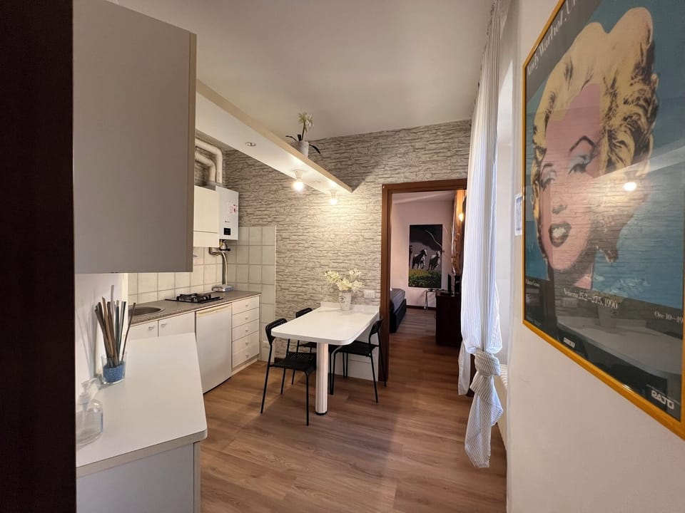 Studio, 1 Bedroom | Private kitchen | Full-size fridge, stovetop, cookware/dishes/utensils