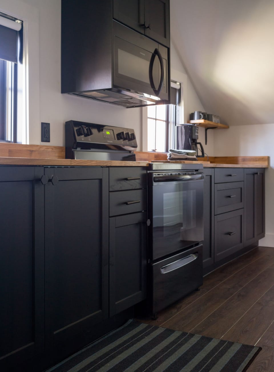 Penthouse King Studio Apartment | Private kitchen | Full-size fridge, microwave, coffee/tea maker, electric kettle