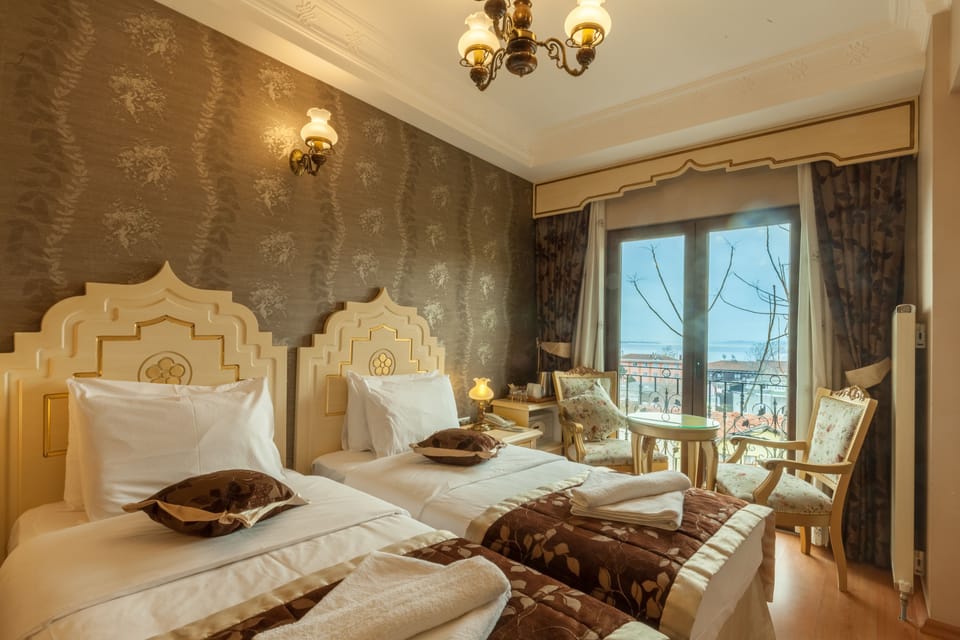 Superior Room, Sea View | Minibar, in-room safe, individually decorated, desk