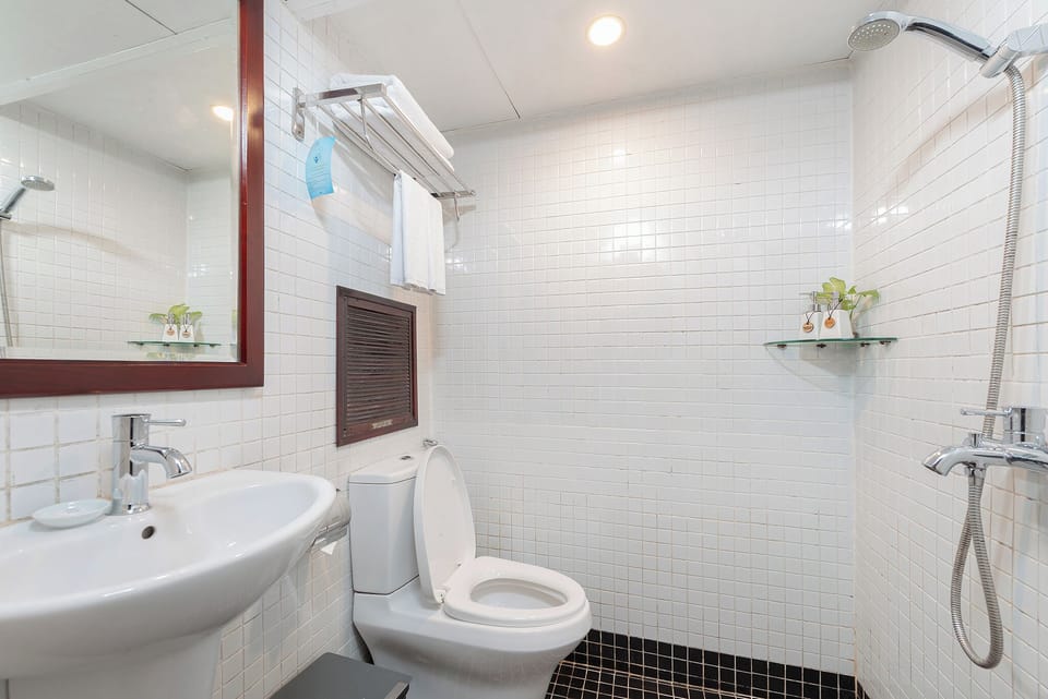 Shower, free toiletries, hair dryer, slippers