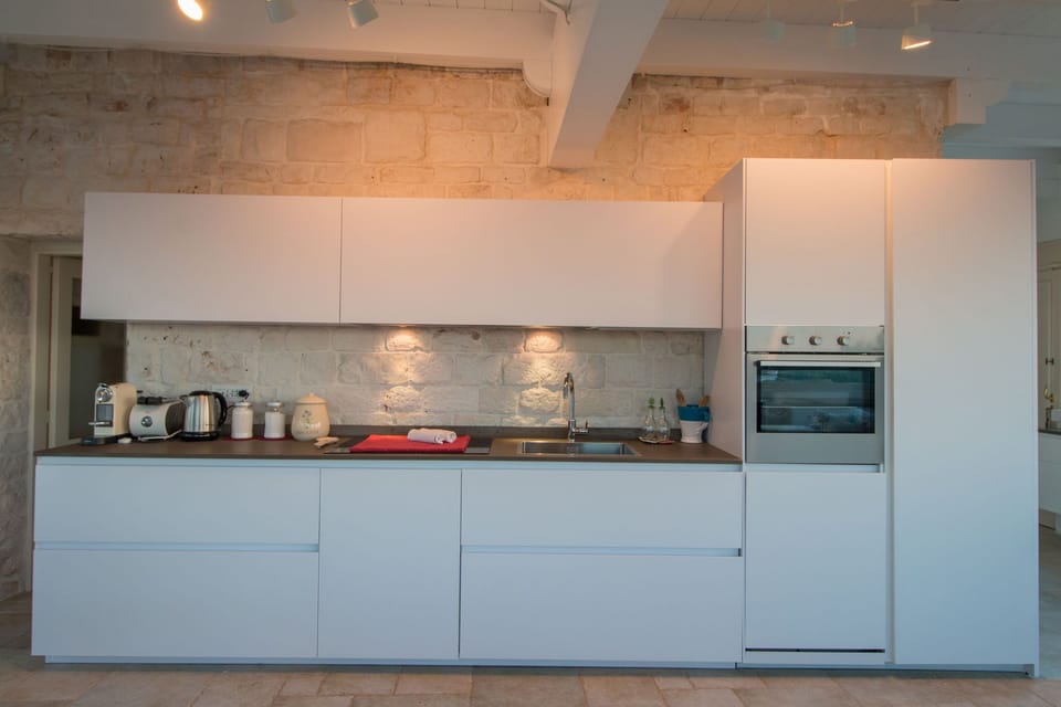 Villa, 4 Bedrooms | Private kitchen | Full-size fridge, oven, stovetop, dishwasher