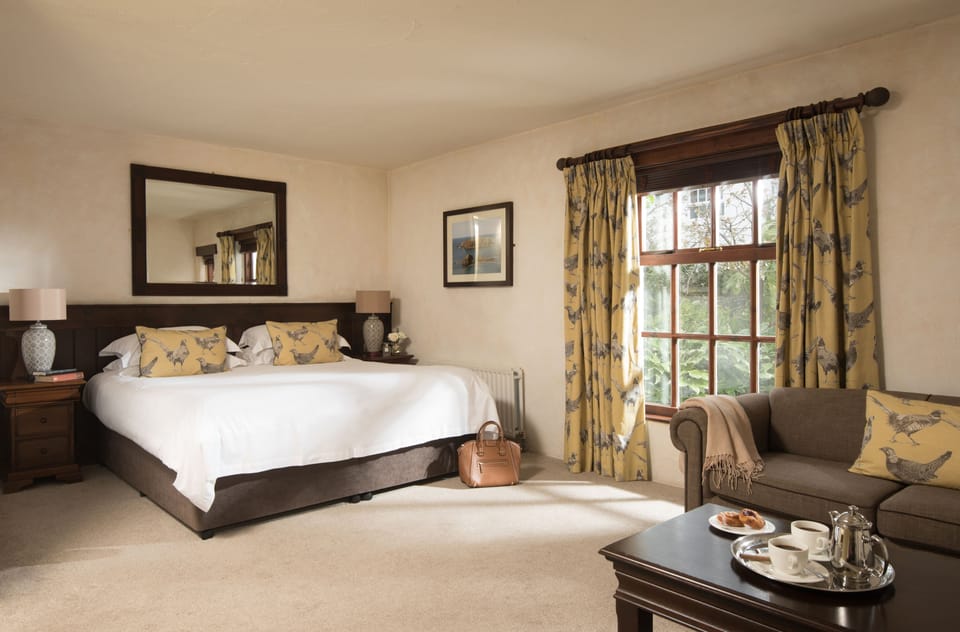 Deluxe Room | Hypo-allergenic bedding, in-room safe, individually decorated