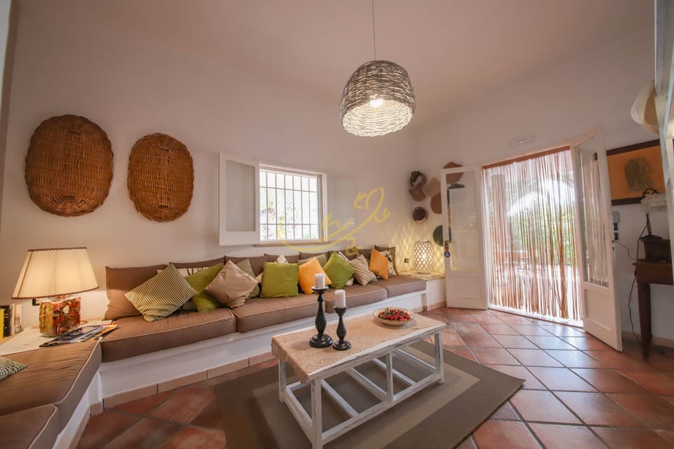 Villa, 4 Bedrooms | Living area | 32-inch TV with digital channels