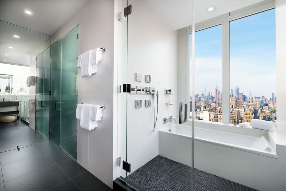 Penthouse | Bathroom | Shower, designer toiletries, hair dryer, towels