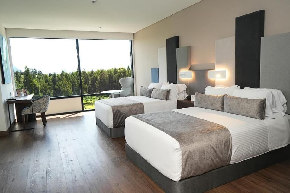Deluxe Room, 2 Double Beds | Minibar, in-room safe, desk, blackout drapes