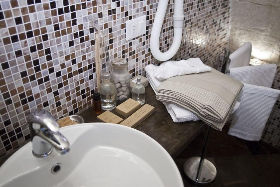 Family Room | Bathroom | Designer toiletries, hair dryer, bathrobes, bidet