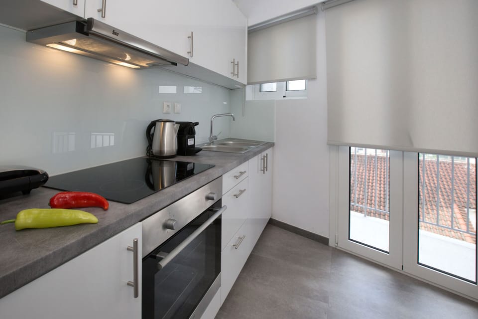 Family Apartment, 3 Bedrooms, 2 Bathrooms | Private kitchen | Fridge, oven, stovetop, coffee/tea maker