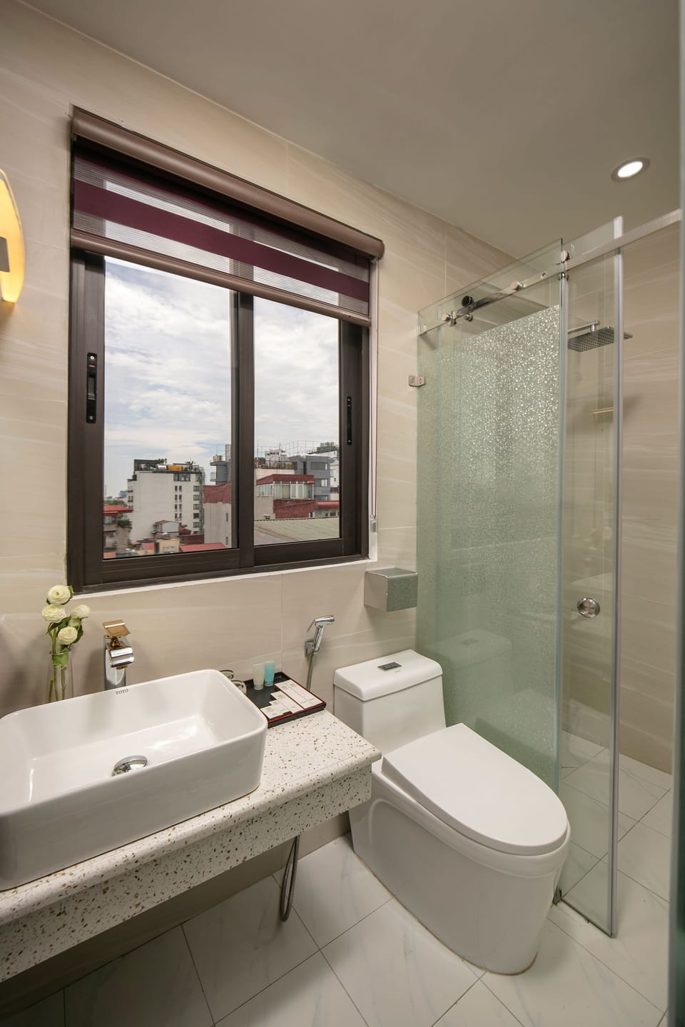 Shower, rainfall showerhead, eco-friendly toiletries, hair dryer