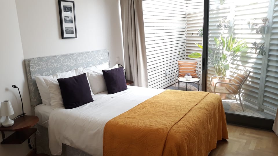 Egyptian cotton sheets, premium bedding, blackout drapes, soundproofing