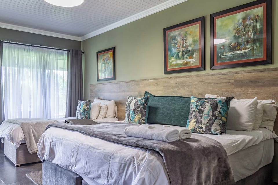 Family Room | Premium bedding, individually decorated, individually furnished, desk