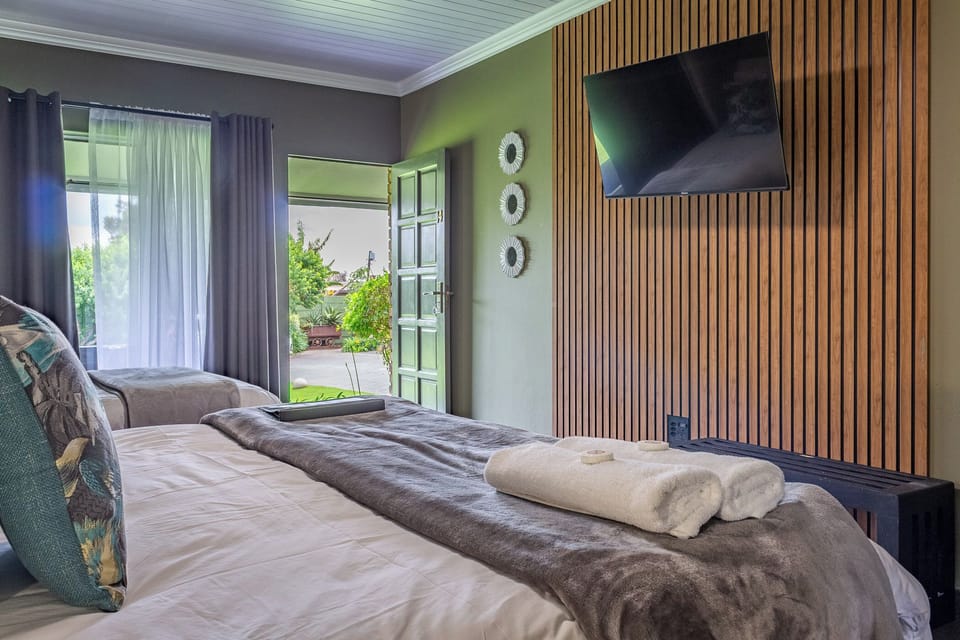 Family Room | Premium bedding, individually decorated, individually furnished, desk