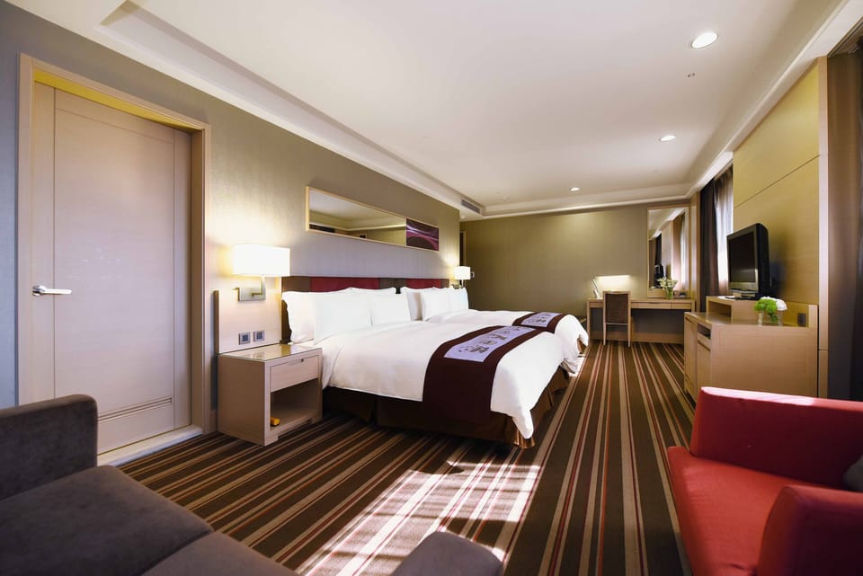 Deluxe Twin Room, 2 Double Beds | In-room safe, blackout drapes, free wired internet, bed sheets