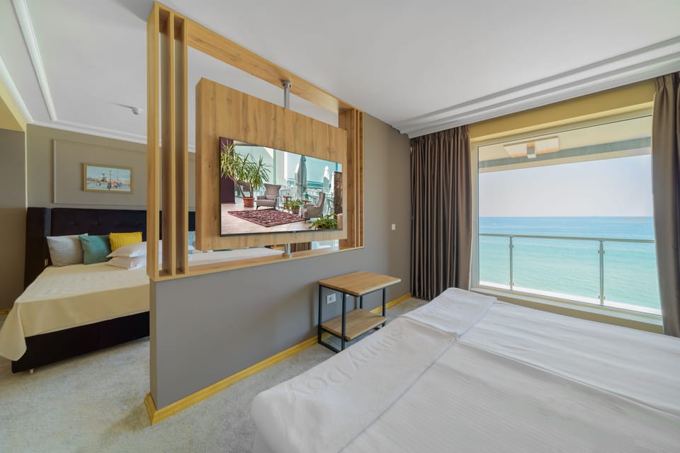 Family Room, Balcony, Sea View | Minibar, in-room safe, free cribs/infant beds, free WiFi