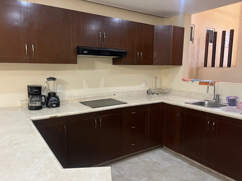 Full-size fridge, stovetop, toaster, blender