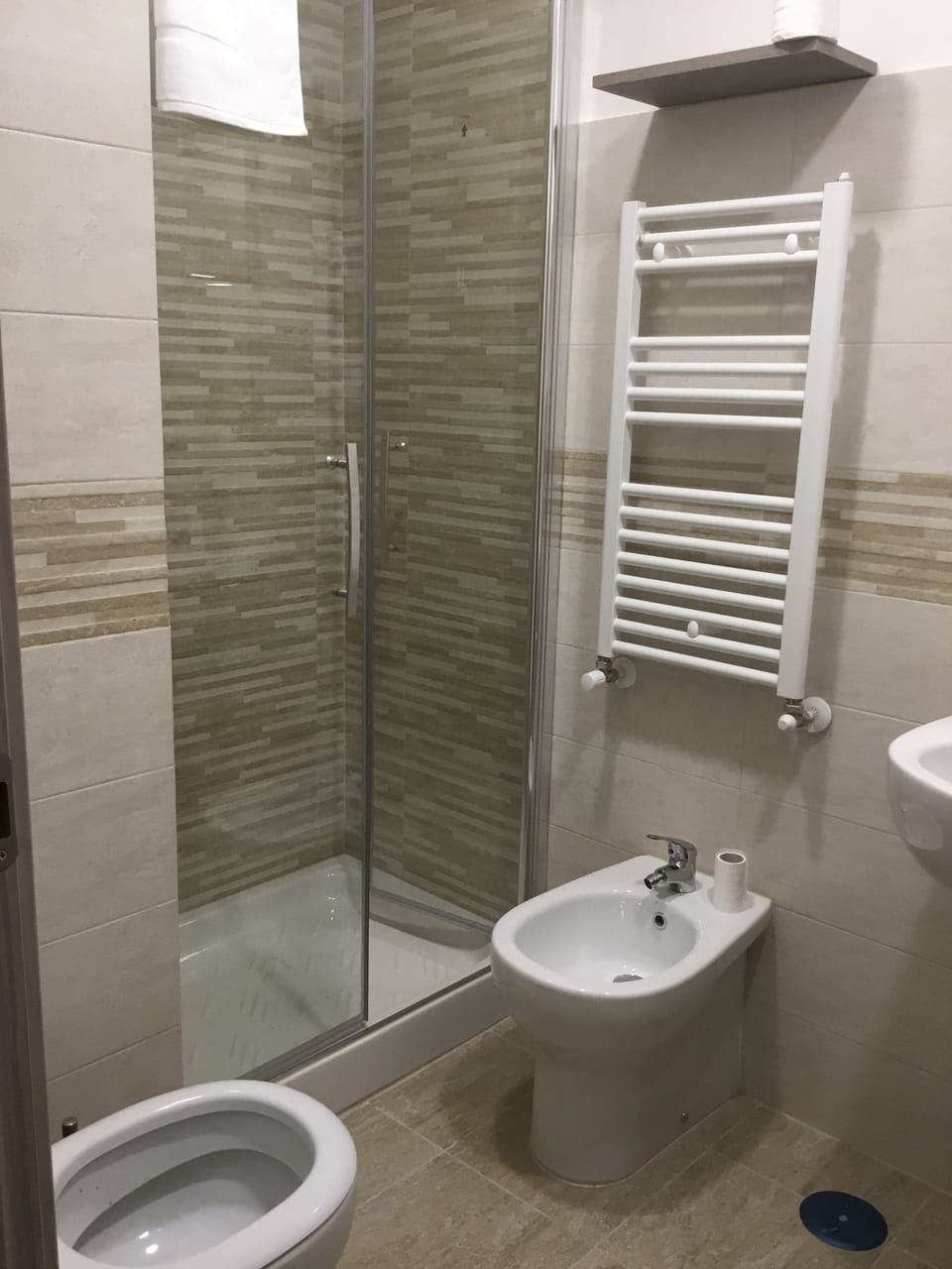 Shower, free toiletries, hair dryer, towels