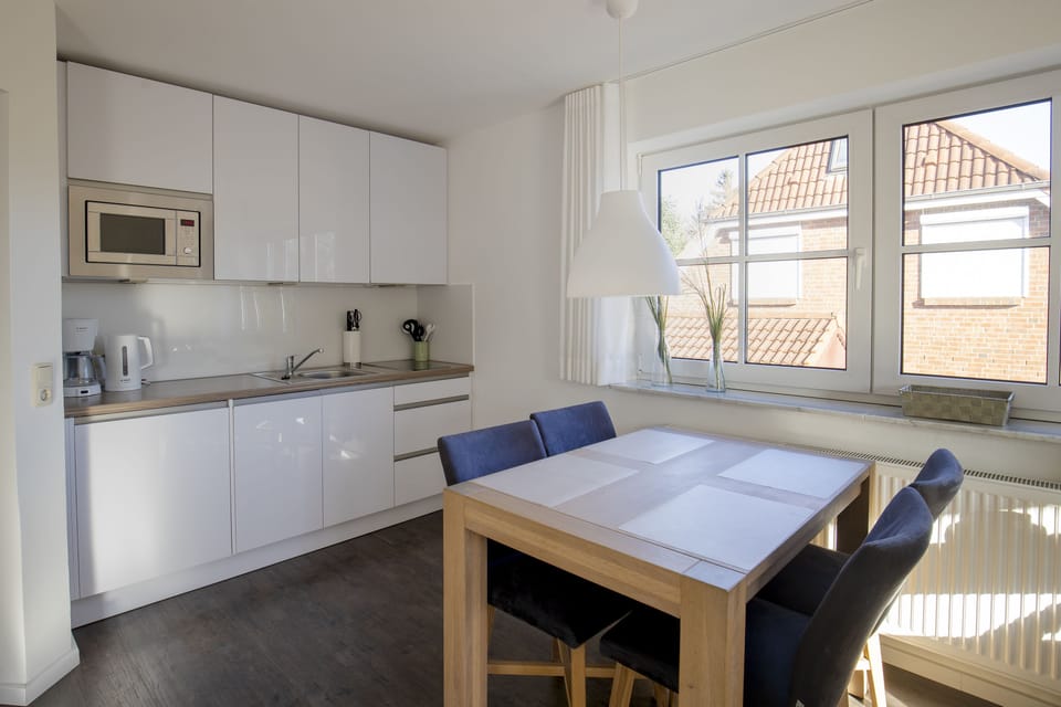 Apartment, Balcony | Private kitchen | Stovetop, coffee/tea maker, electric kettle, toaster