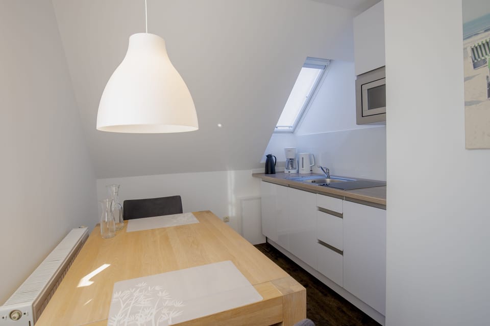 Apartment, Balcony | Private kitchen | Stovetop, coffee/tea maker, electric kettle, toaster