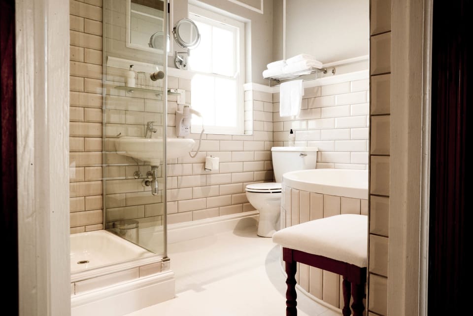 Family Room, Multiple Beds | Bathroom | Free toiletries, hair dryer, towels