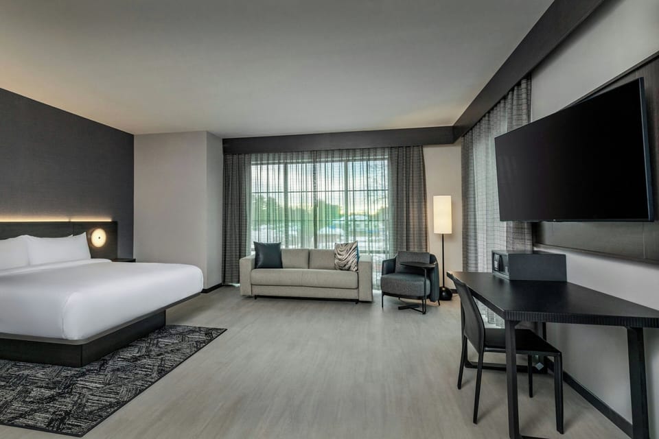 Room, 1 King Bed with Sofa bed, Corner | Hypo-allergenic bedding, desk, laptop workspace, blackout drapes