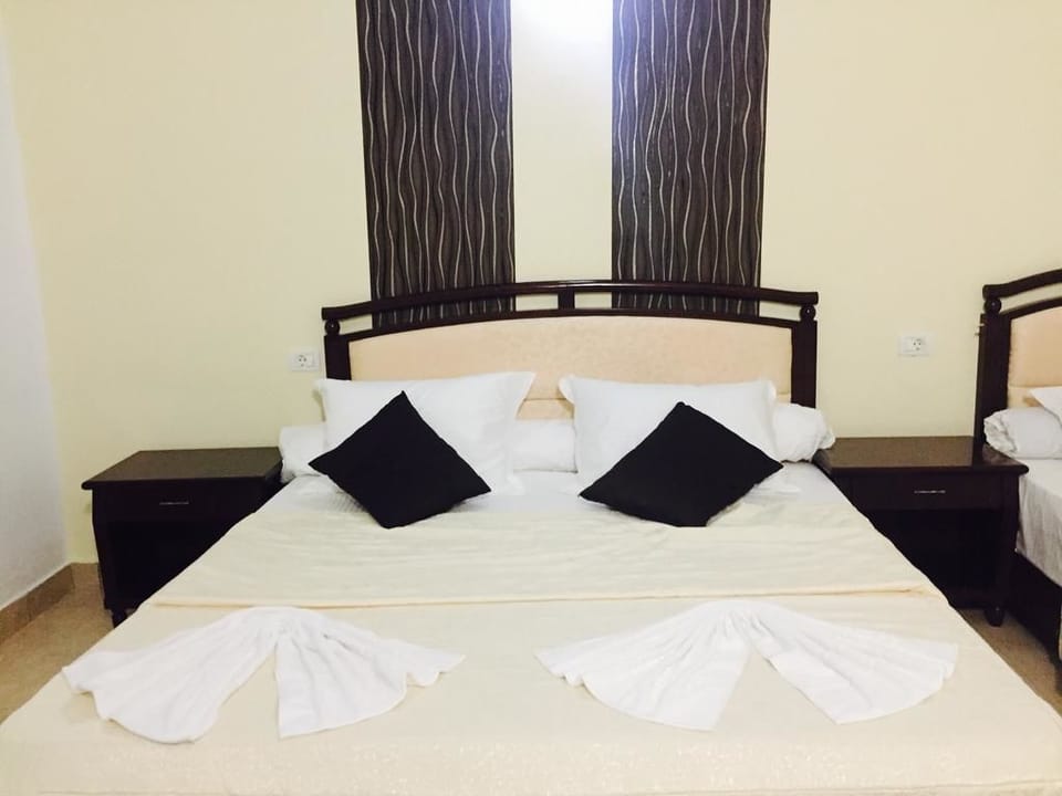 Comfort Triple Room, Balcony, Beach View | In-room safe, individually decorated, individually furnished, desk